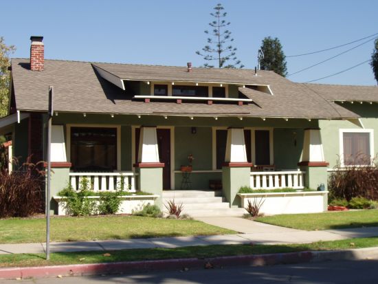 green with columns house.jpg